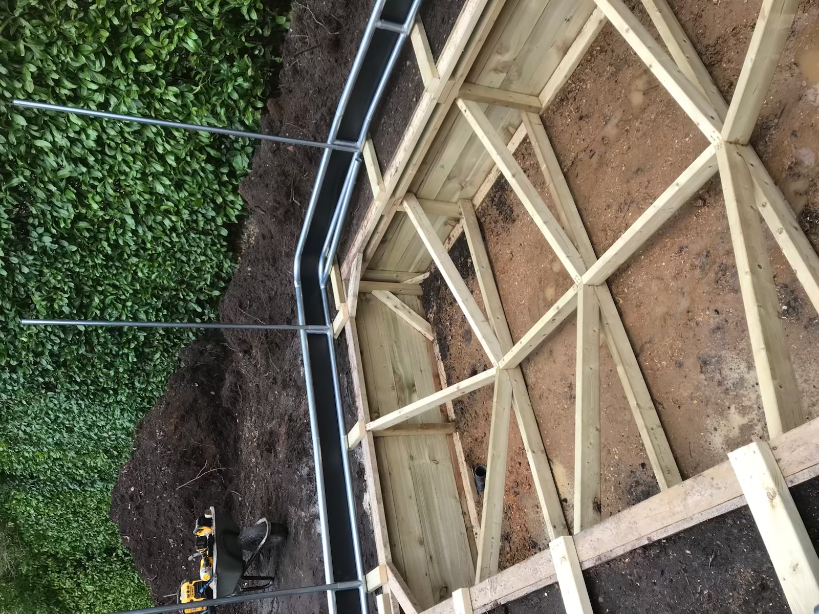 Garden Terracing with Wooden Retaining Wall