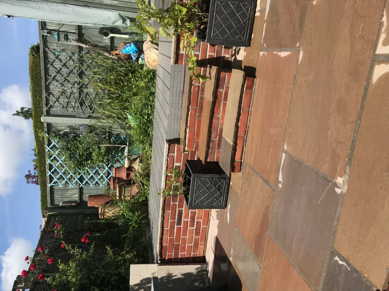 Patio with Brick Steps & Garden Planting